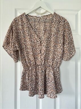 Sienna Sky || Floral Print V-Neck Peplum Blouse in Light Beige